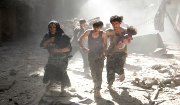 Fleeing a barrel-bomb attack