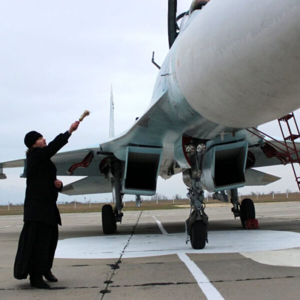 False religion blessing war plane
